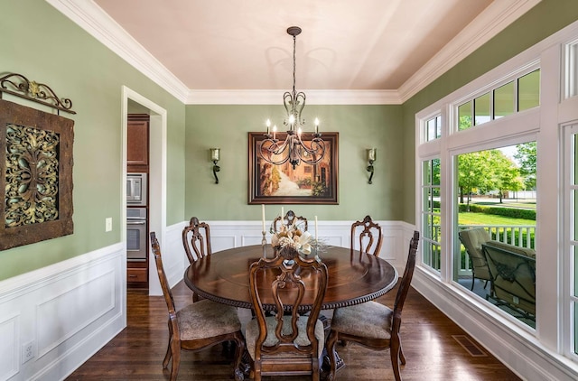 1706 Townsend Blvd, Franklin, TN 37064 - dining area featuring a chandelier, wainscoting, ornamental molding, dark wood-style flooring, and a decorative wall
