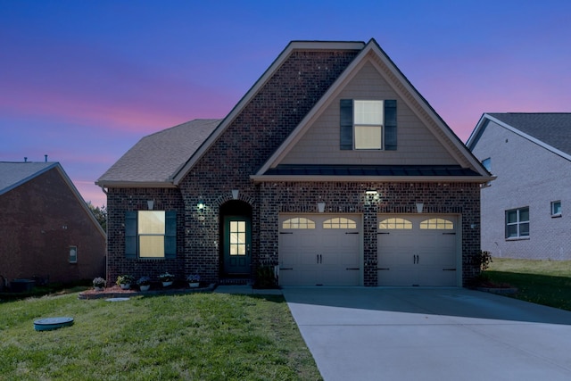 566 Oakvale Ln, Mount Juliet, TN 37122 - traditional-style home with brick siding, driveway, a lawn, and a garage