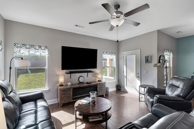 566 Oakvale Ln, Mount Juliet, TN 37122 - living area with dark wood-style floors, baseboards, and a ceiling fan