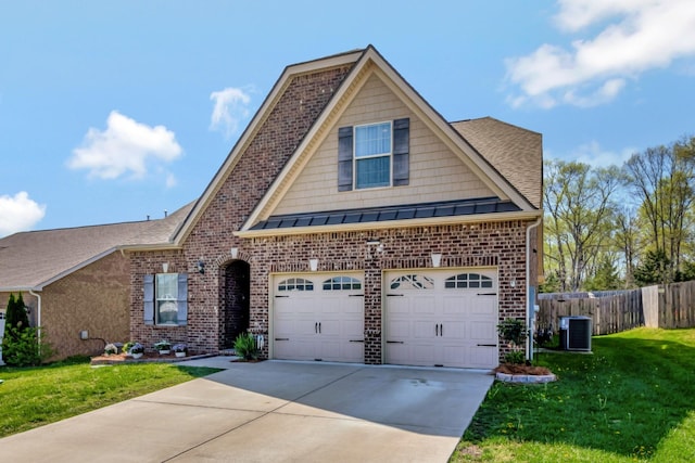 566 Oakvale Ln, Mount Juliet, TN 37122 - view of front facade featuring cooling unit, brick siding, driveway, an attached garage, and a shingled roof