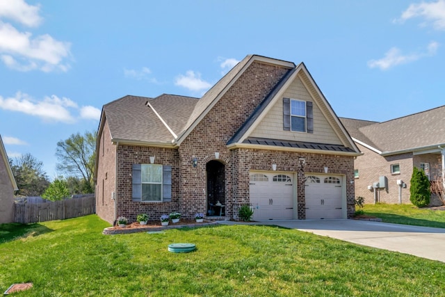566 Oakvale Ln, Mount Juliet, TN 37122 - traditional-style house with driveway, brick siding, an attached garage, and a standing seam roof
