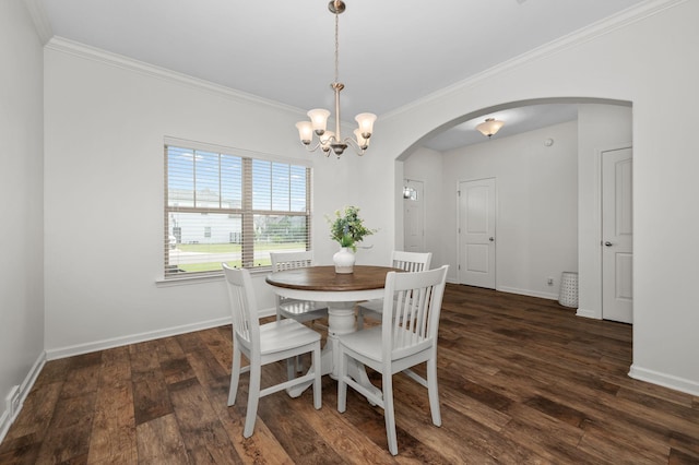 1113 Dunkirk Ln, Murfreesboro, TN 37129 - dining space featuring arched walkways, crown molding, a chandelier, wood finished floors, and baseboards
