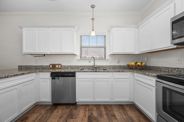 1113 Dunkirk Ln, Murfreesboro, TN 37129 - kitchen with stainless steel appliances, a sink, white cabinetry, dark stone countertops, and ornamental molding