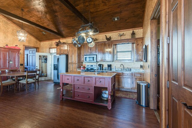 0 Fletcher Rd, Gruetli Laager, TN 37339 - kitchen featuring stainless steel appliances, dark wood-style floors, light countertops, hanging light fixtures, and a sink