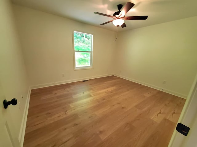 321 Turkey Creek Hwy, Carthage, TN 37030 - empty room with wood finished floors, baseboards, and ceiling fan