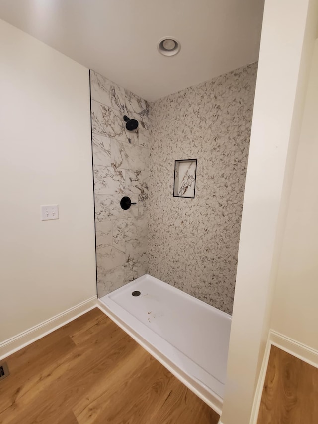 321 Turkey Creek Hwy, Carthage, TN 37030 - bathroom featuring a shower stall, wood finished floors, and baseboards