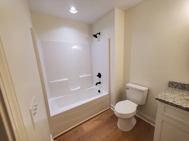 321 Turkey Creek Hwy, Carthage, TN 37030 - full bath with wood finished floors, vanity, toilet,  shower combination, and baseboards