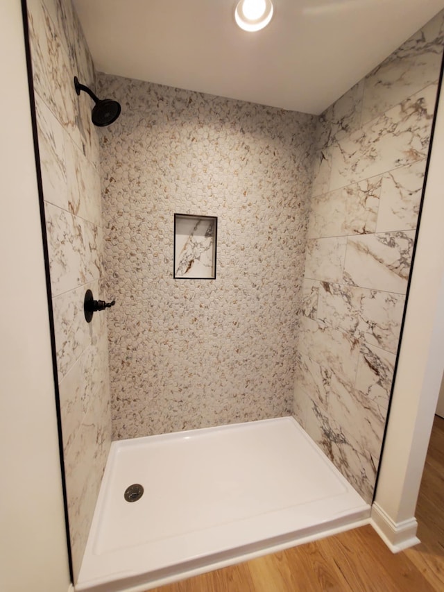 321 Turkey Creek Hwy, Carthage, TN 37030 - full bathroom with a stall shower and wood finished floors