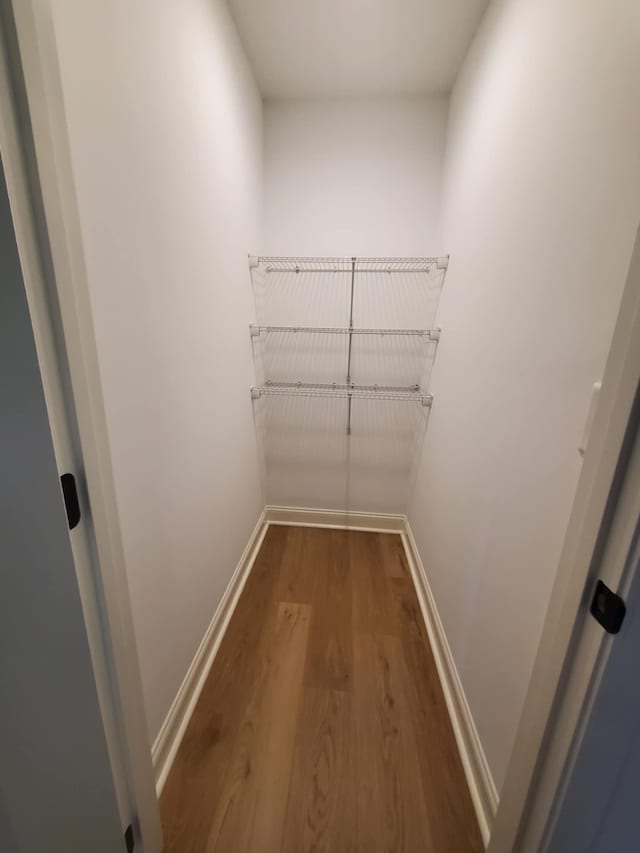 321 Turkey Creek Hwy, Carthage, TN 37030 - walk in closet with dark wood finished floors