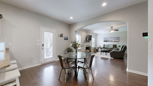 5127 Heroes Ln, Murfreesboro, TN 37129 - dining space with arched walkways, a ceiling fan, dark wood-style floors, baseboards, and recessed lighting