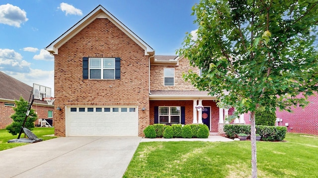 5127 Heroes Ln, Murfreesboro, TN 37129 - traditional home with an attached garage, a front lawn, concrete driveway, and brick siding