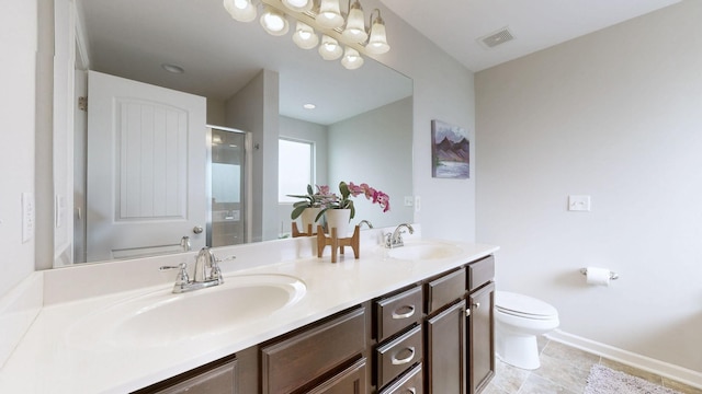5127 Heroes Ln, Murfreesboro, TN 37129 - full bath with double vanity, toilet, a stall shower, and baseboards