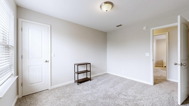 5127 Heroes Ln, Murfreesboro, TN 37129 - carpeted empty room with baseboards