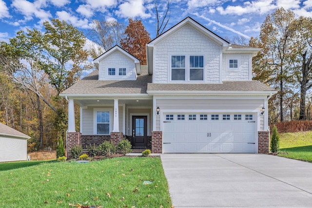 7214 Hanworth St, Fairview, TN 37062 - craftsman house with concrete driveway, a front lawn, brick siding, and a porch