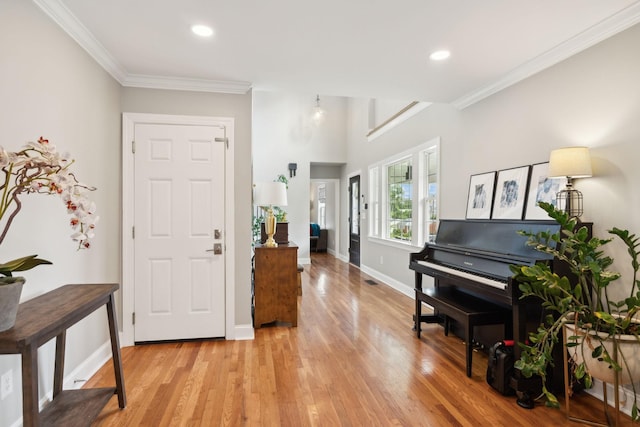 303 Avondale Dr, Franklin, TN 37064 - entrance foyer featuring light wood-style flooring, crown molding, recessed lighting, and baseboards