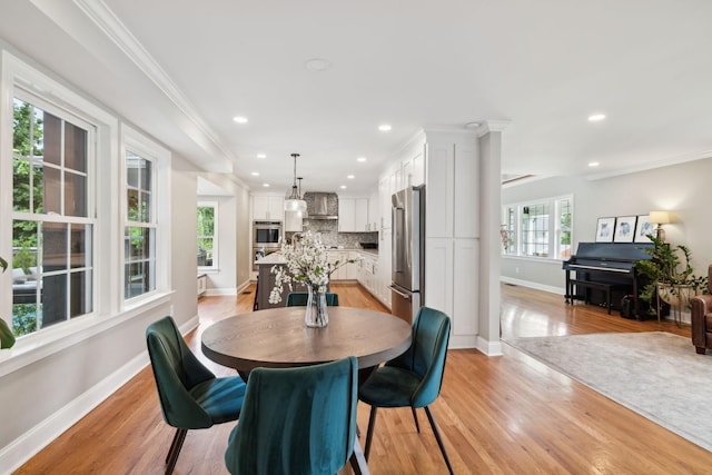 303 Avondale Dr, Franklin, TN 37064 - dining space with baseboards, light wood-type flooring, recessed lighting, and crown molding
