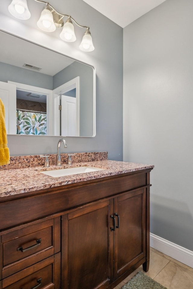 303 Avondale Dr, Franklin, TN 37064 - bathroom featuring vanity and baseboards