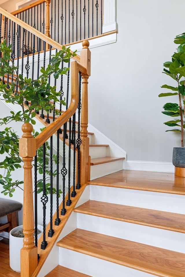 303 Avondale Dr, Franklin, TN 37064 - staircase with baseboards and wood finished floors