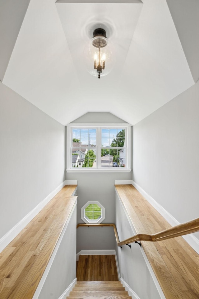 303 Avondale Dr, Franklin, TN 37064 - staircase with vaulted ceiling, wood finished floors, and baseboards