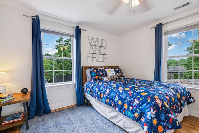 303 Avondale Dr, Franklin, TN 37064 - bedroom featuring wood finished floors, baseboards, and ceiling fan