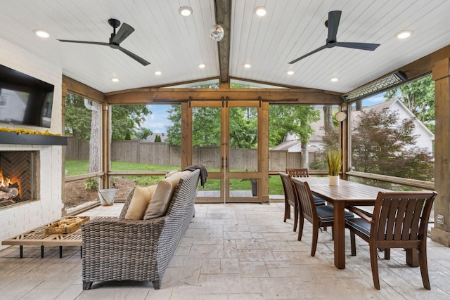 303 Avondale Dr, Franklin, TN 37064 - sunroom featuring an outdoor brick fireplace, a ceiling fan, and outdoor dining space
