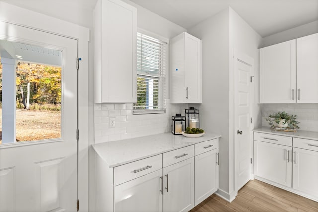 7218 Hanworth St, Fairview, TN 37062 - kitchen with white cabinets and light wood-style floors