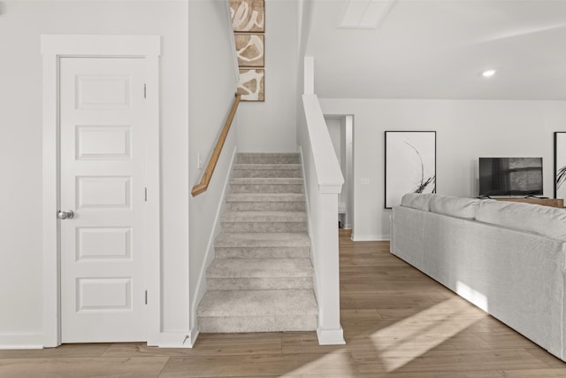 7218 Hanworth St, Fairview, TN 37062 - stairway featuring wood finished floors, baseboards, and recessed lighting