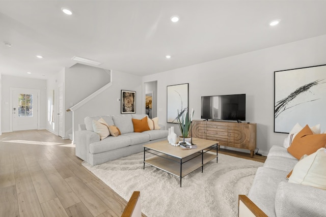 7218 Hanworth St, Fairview, TN 37062 - living area with light wood-type flooring, stairway, recessed lighting, and baseboards