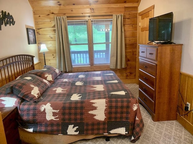 839 Golf View Blvd, Pigeon Forge, TN 37863 - bedroom with wood walls and light carpet