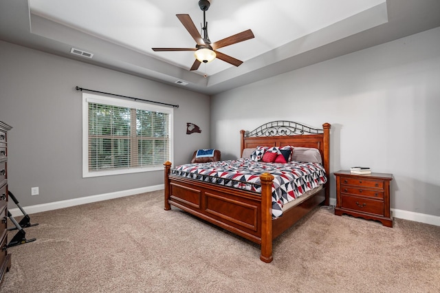 2743 Crowne Pointe Dr, Murfreesboro, TN 37130 - bedroom featuring light carpet, baseboards, a tray ceiling, and ceiling fan