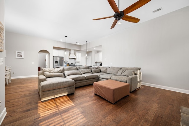 2743 Crowne Pointe Dr, Murfreesboro, TN 37130 - living area featuring arched walkways, ceiling fan, dark wood finished floors, baseboards, and recessed lighting