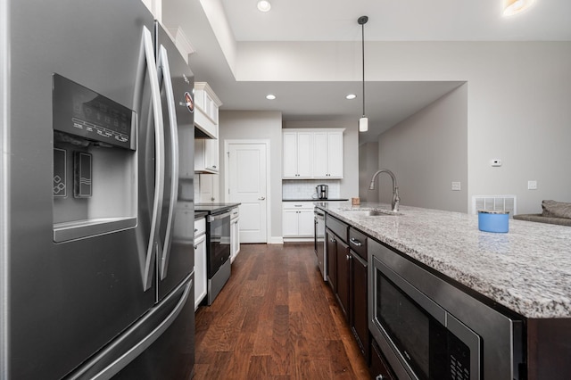 2743 Crowne Pointe Dr, Murfreesboro, TN 37130 - kitchen featuring appliances with stainless steel finishes, a sink, dark wood-type flooring, white cabinets, and recessed lighting