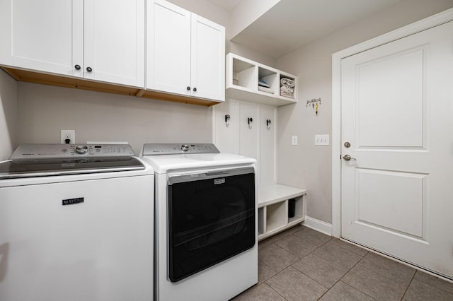 2743 Crowne Pointe Dr, Murfreesboro, TN 37130 - laundry room featuring washer and dryer, cabinet space, light tile patterned flooring, and baseboards
