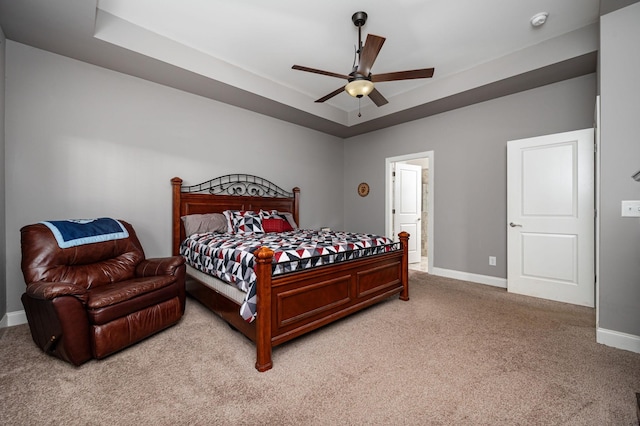2743 Crowne Pointe Dr, Murfreesboro, TN 37130 - bedroom with light carpet, a tray ceiling, baseboards, and ceiling fan