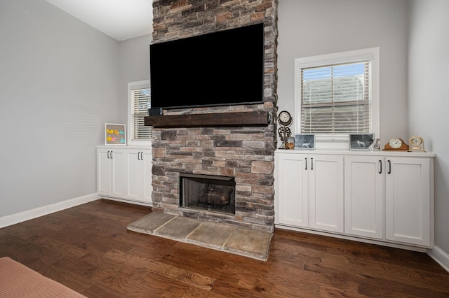2743 Crowne Pointe Dr, Murfreesboro, TN 37130 - living room with a stone fireplace, dark wood-type flooring, and baseboards