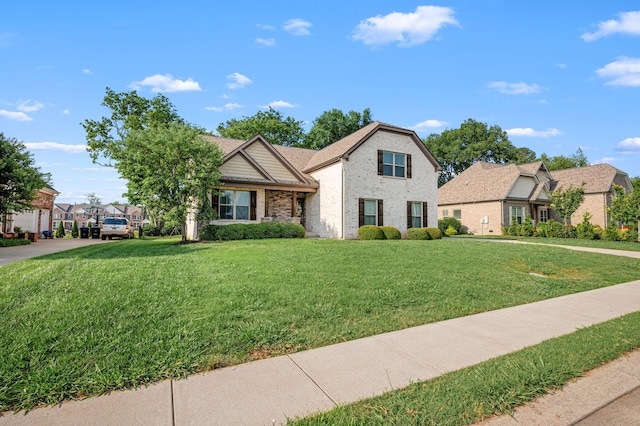 2743 Crowne Pointe Dr, Murfreesboro, TN 37130 - view of front of house featuring a front yard, brick siding, and a residential view