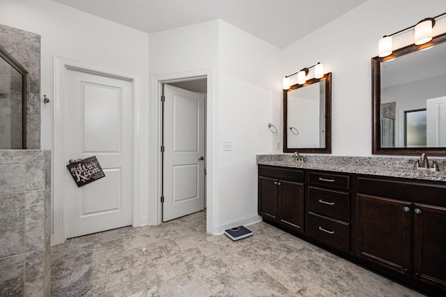 2743 Crowne Pointe Dr, Murfreesboro, TN 37130 - bathroom with tiled shower, double vanity, and baseboards