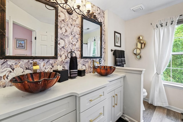 1514 Cardinal Ln, Mount Juliet, TN 37122 - bathroom with toilet, plenty of natural light, vanity, and a chandelier