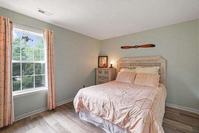 1514 Cardinal Ln, Mount Juliet, TN 37122 - bedroom featuring multiple windows, wood finished floors, and baseboards