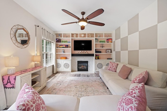 1514 Cardinal Ln, Mount Juliet, TN 37122 - living room featuring ceiling fan, light wood-type flooring, and a fireplace