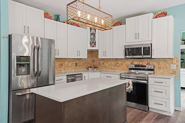 1514 Cardinal Ln, Mount Juliet, TN 37122 - kitchen featuring stainless steel appliances, a sink, light countertops, white cabinets, and dark wood-style flooring