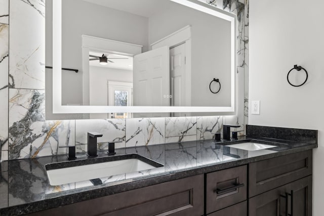 1904 Manchester Ave, Nashville, TN 37218 - full bath featuring double vanity, tasteful backsplash, and ceiling fan