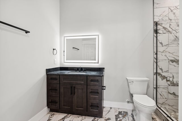 1904 Manchester Ave, Nashville, TN 37218 - bathroom with marble finish floors, vanity, toilet, baseboards, and a shower