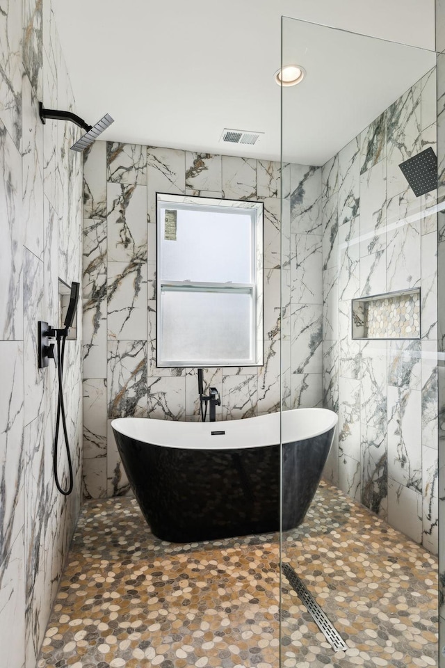 1904 Manchester Ave, Nashville, TN 37218 - bathroom with a freestanding bath and a marble finish shower