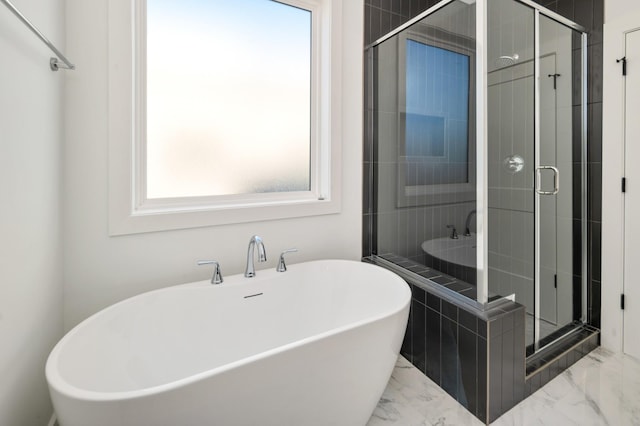 107 E 9th St Unit D7, Columbia, TN 38401 - full bath with a shower stall, a freestanding bath, and marble finish flooring