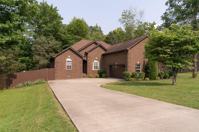 3006 Gracie Ann Dr, Greenbrier, TN 37073 - ranch-style house featuring brick siding, driveway, and an attached garage