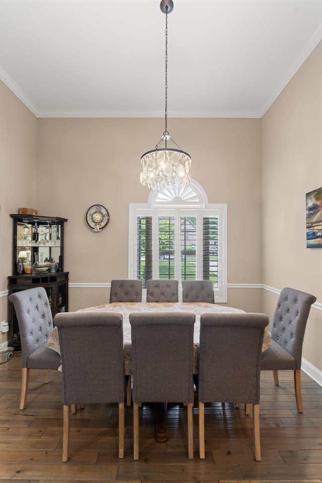 3006 Gracie Ann Dr, Greenbrier, TN 37073 - dining space with ornamental molding, hardwood / wood-style flooring, a chandelier, and baseboards