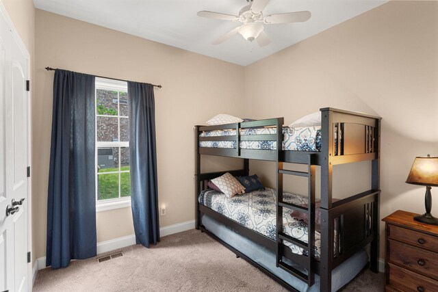 3006 Gracie Ann Dr, Greenbrier, TN 37073 - carpeted bedroom featuring multiple windows, baseboards, and a ceiling fan