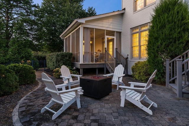 403 Butterfly Ct, Franklin, TN 37069 - view of patio with stairs, a sunroom, and an outdoor fire pit
