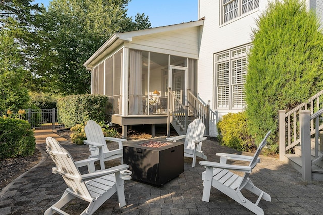 403 Butterfly Ct, Franklin, TN 37069 - view of patio / terrace with a sunroom, an outdoor fire pit, and stairs